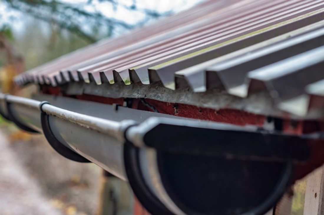 Professionally installed guttering on residential roof
