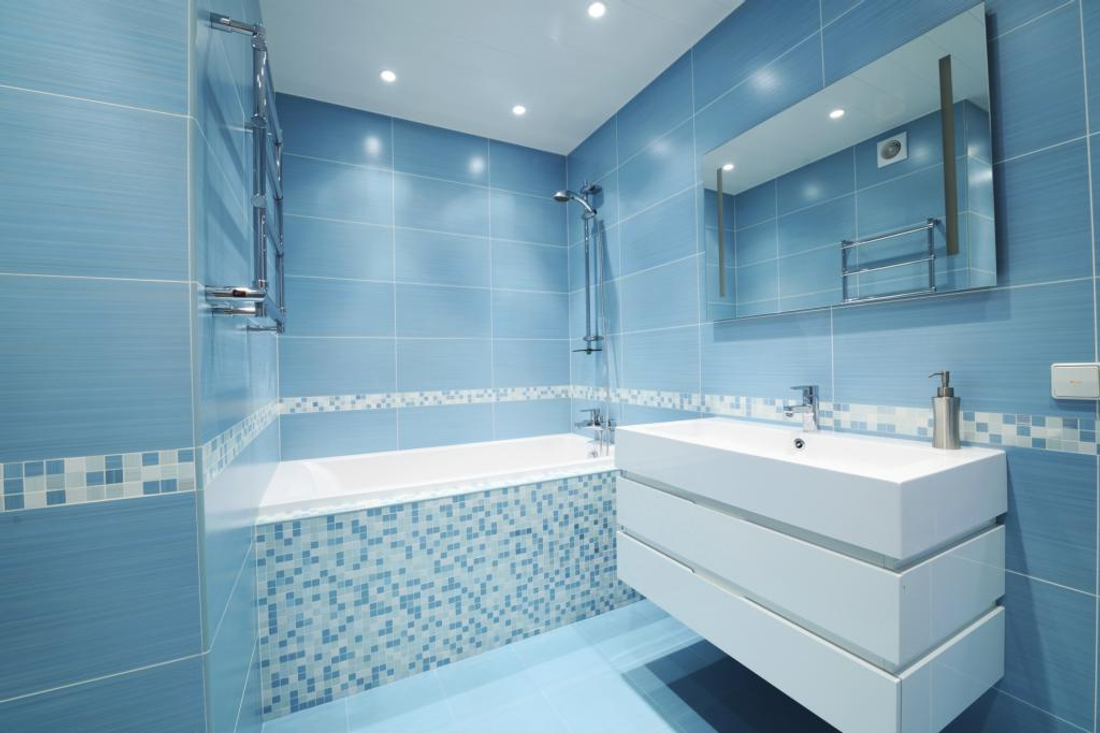 Mosaics can be used alongside standard tiles to reduce costs