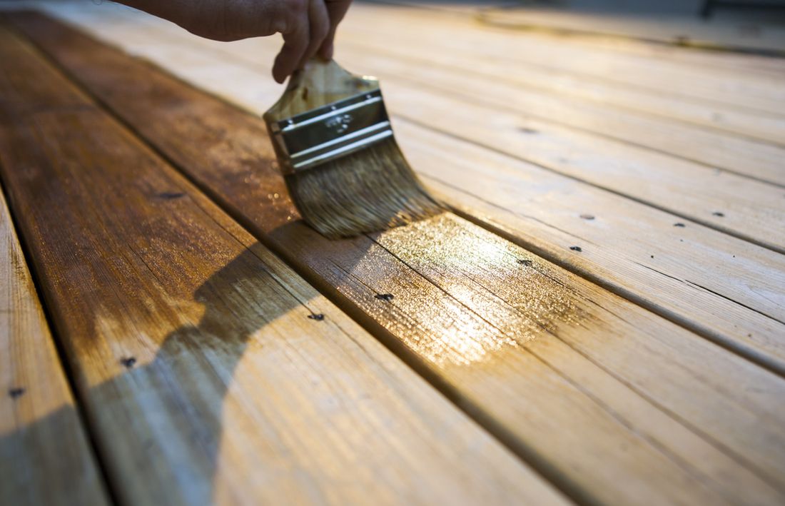 Deck maintenance to clean and refinish decking