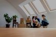 Happy family under the bright skylight